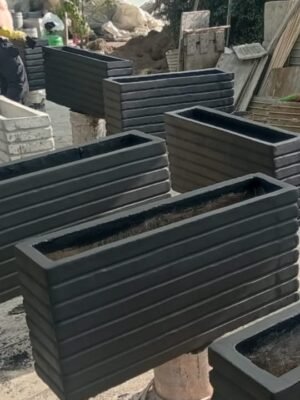 Materas en cemento tipo jardinera acanalada